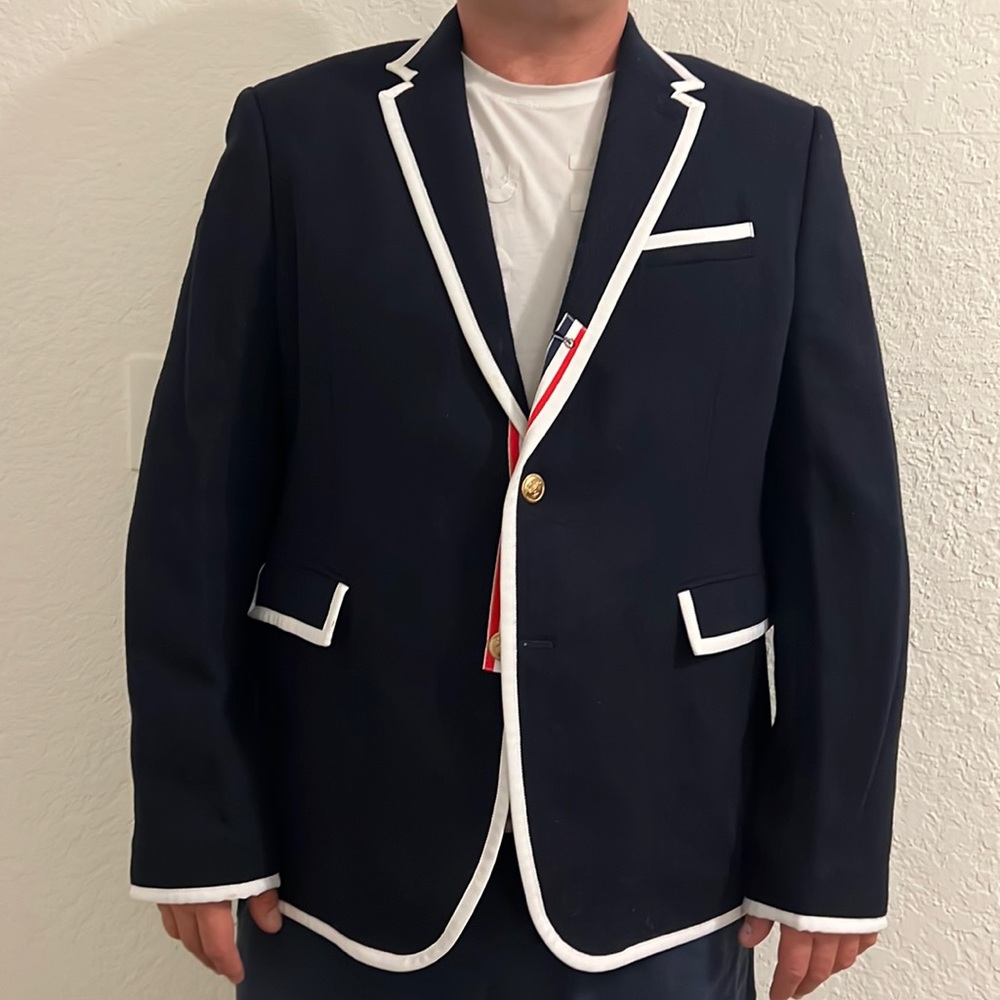 Thom Browne navy and white sport blazer.